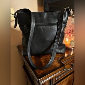 Sleek Tiganello Black Leather Shoulder Bag